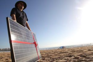 Solar panel gift on Manly beach as Common Grace ask PM Tony Abbott to #acceptthegift of solar for Kirribilli House by Kate Ausburn via Flckr