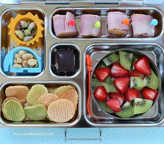 Kindergarten school lunch - ham & cheese rolls, nuts, veggie chips, strawberries and kiwi, organic dark chocolate by Melissa via Flickr