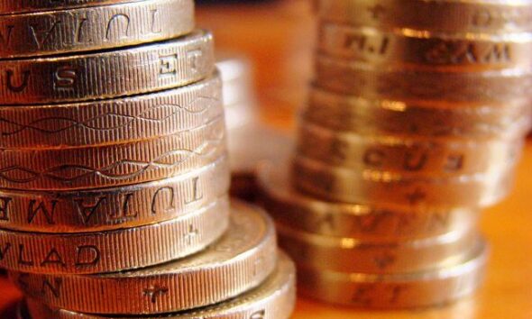 Pound Coins by JD Mack via flickr