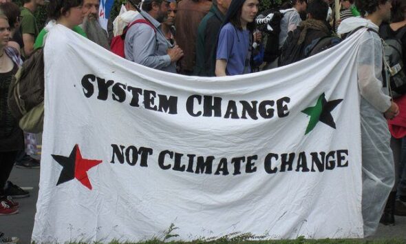 System Change Not Climate Change by Eoghan Olionnain via flickr