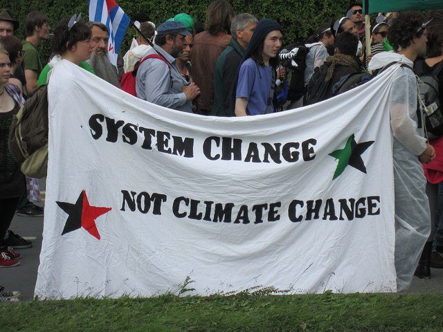 System Change Not Climate Change by Eoghan Olionnain via flickr