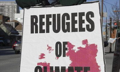 Climate Change Refugees by ItzaFineDay via flickr