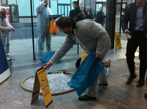 Placing a warning sign beside the ice