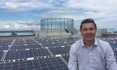 WWF Scotland director Lang Banks visiting rooftop solar installation in Edinburgh