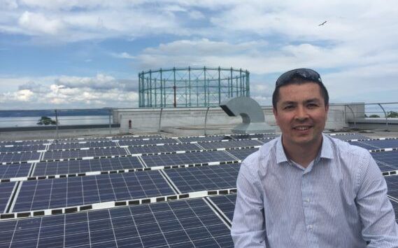 WWF Scotland director Lang Banks visiting rooftop solar installation in Edinburgh