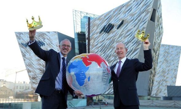 titanic-belfast-ceo-tim-husbands-mbe-and-vice-chairman-conal-harvey-celebrate-titanic-belfast-being-crowned-king-of-the-world
