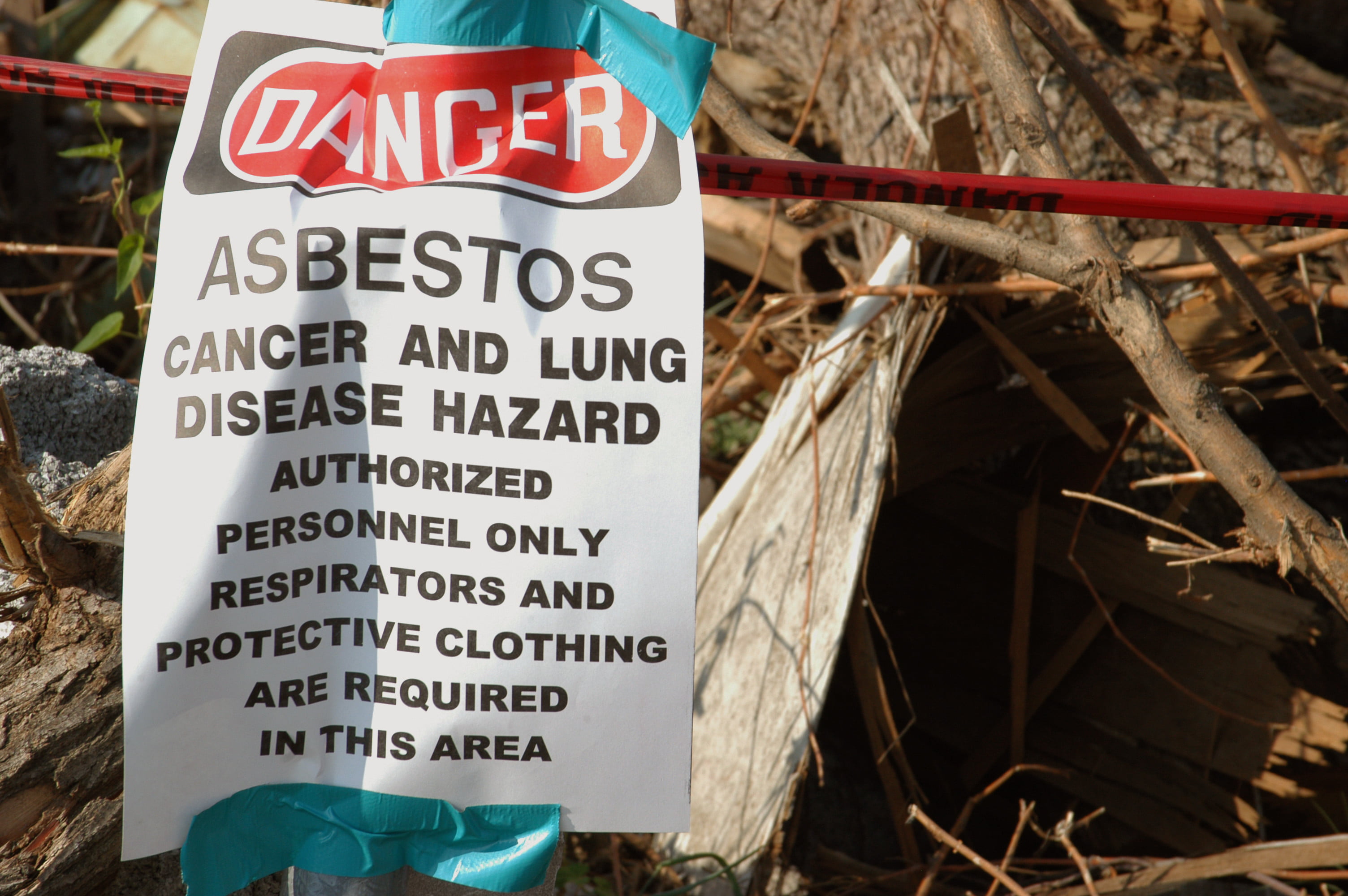 Crews remove asbestos debris