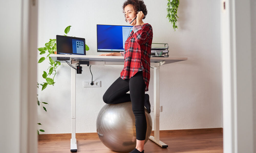 adjustable desks can help eco-friendly workers be more comfortalbe working from home to lower their carbon foorptints
